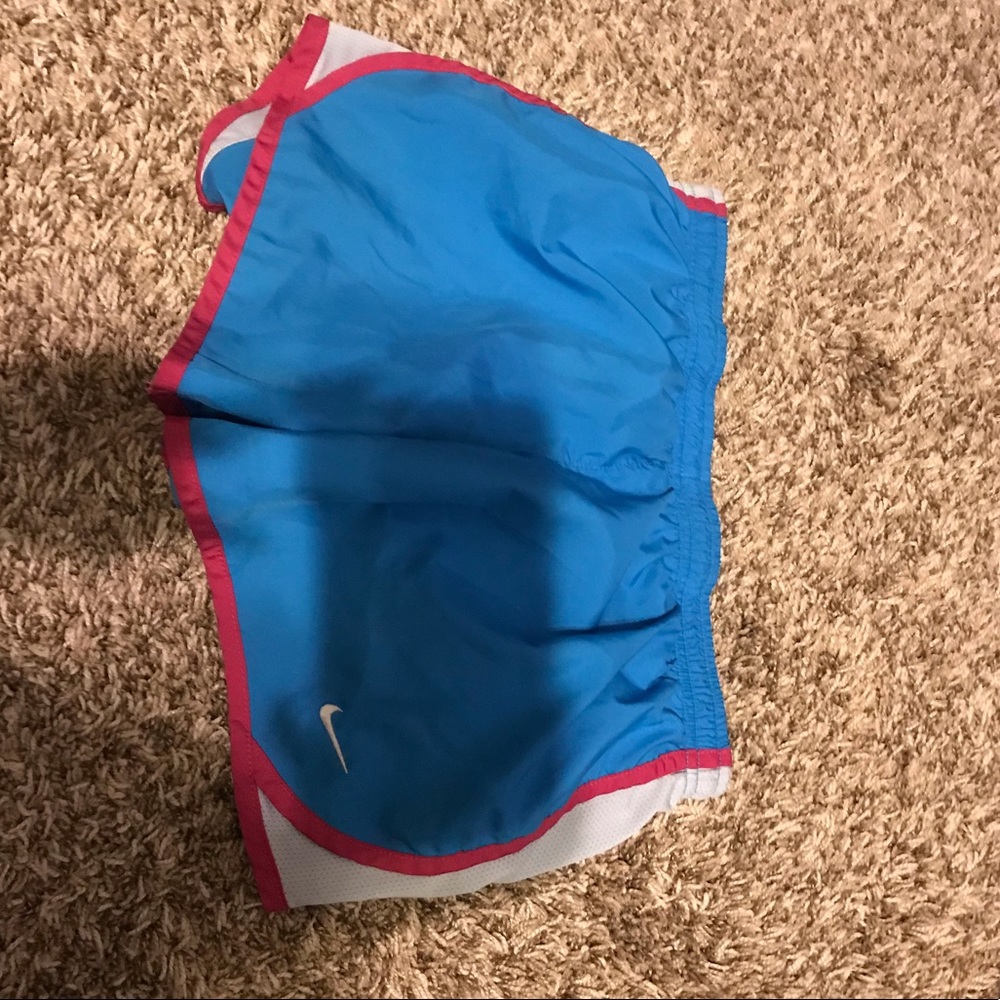 Blue and pink athletic shorts.